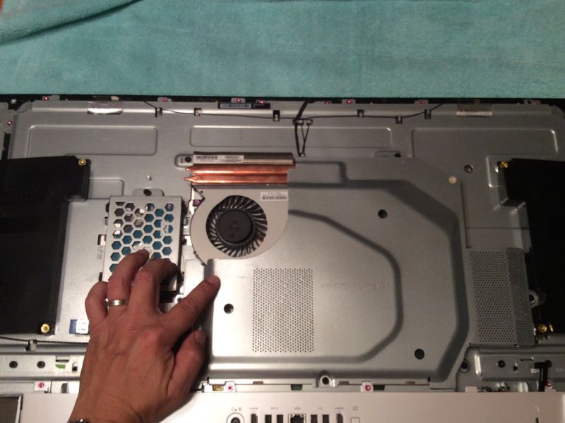 Take this shield off.  Finger is pointing where the plug is.