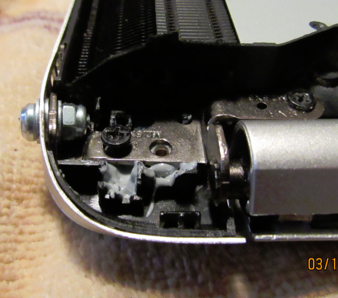 Left Side: with the screw / washers / nyloc nut / epoxy