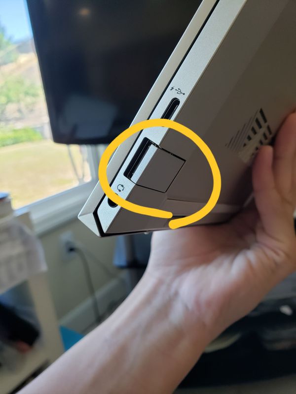 Solved: What is this weird flap that came attached to my usb-c on my... - HP Support Community -