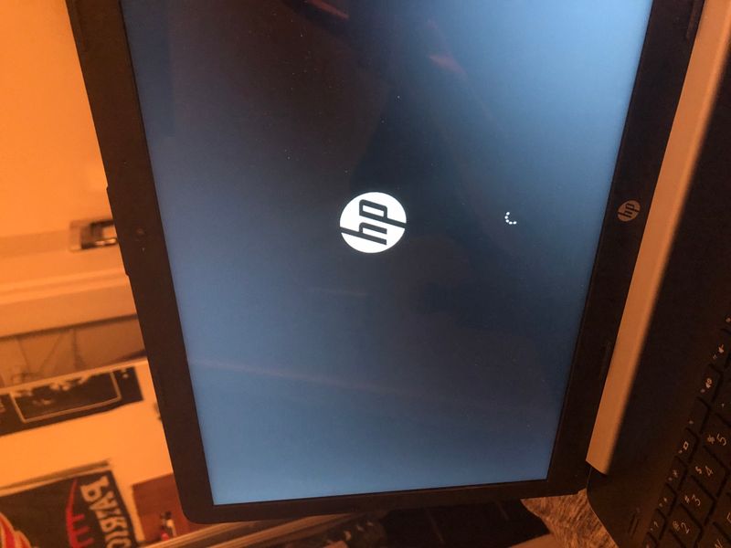 Laptop stuck on hp loading screen with circles - HP Support Community -  7254190