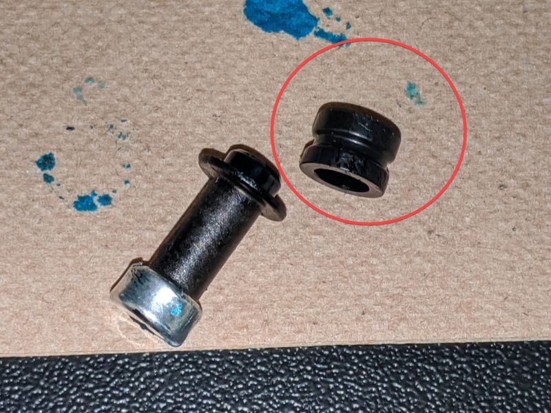 The circled part is the washer.