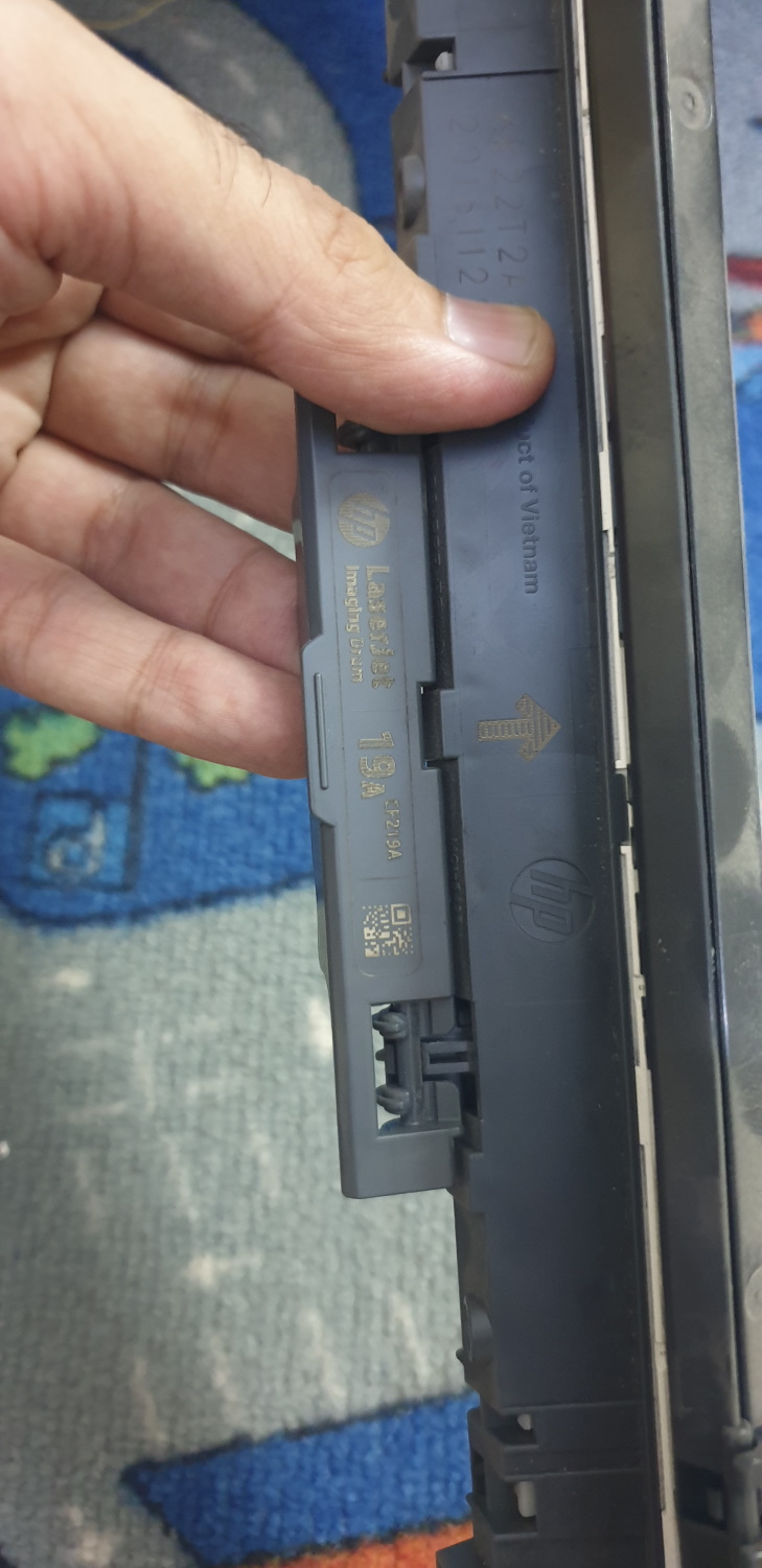 LaserJet Pro M102A printing black smudges on left and right HP