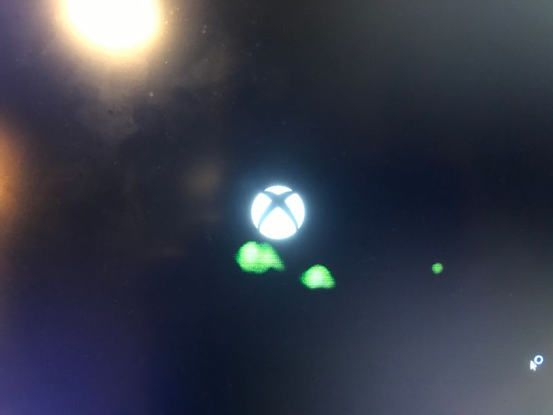 this is a photo taken with my phone .  I did it as the xbox app started just because it has a black background