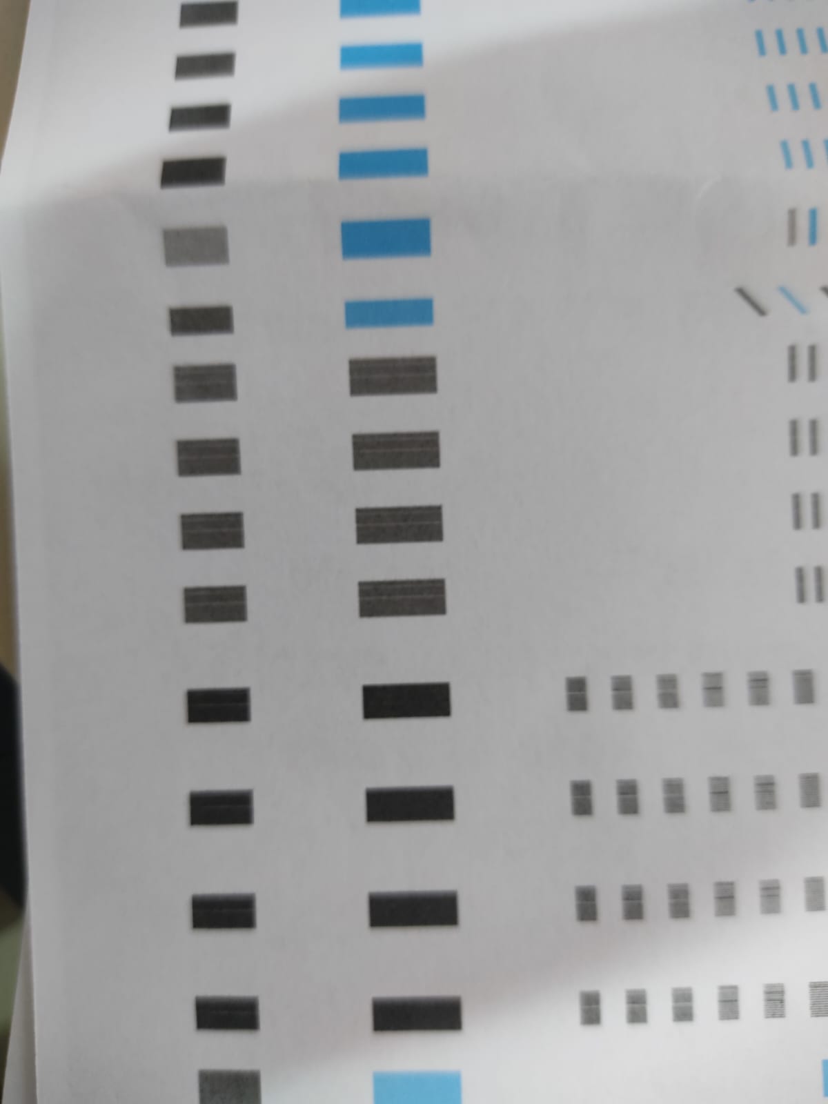 white lines across the colour blocks , i cleaning the print HP