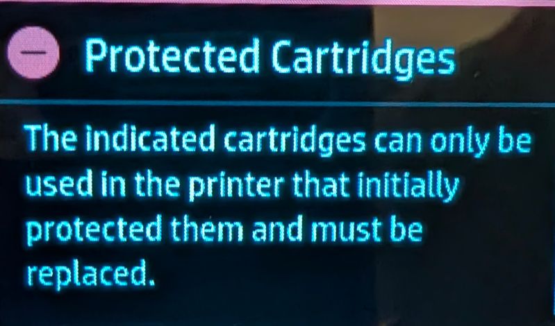 protected cartridges notification on printer display.jpg