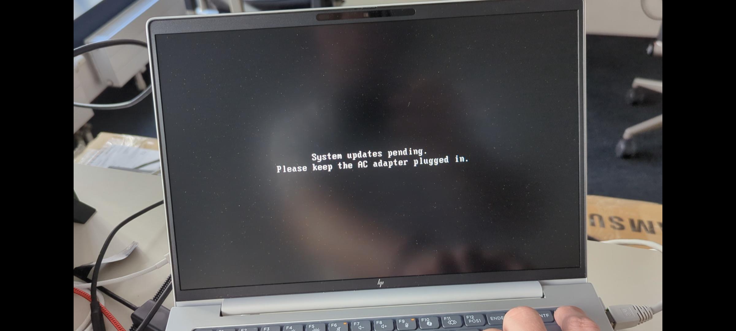 Solved: System updates pnding. Please keep ac adapter plugged in. - HP ...