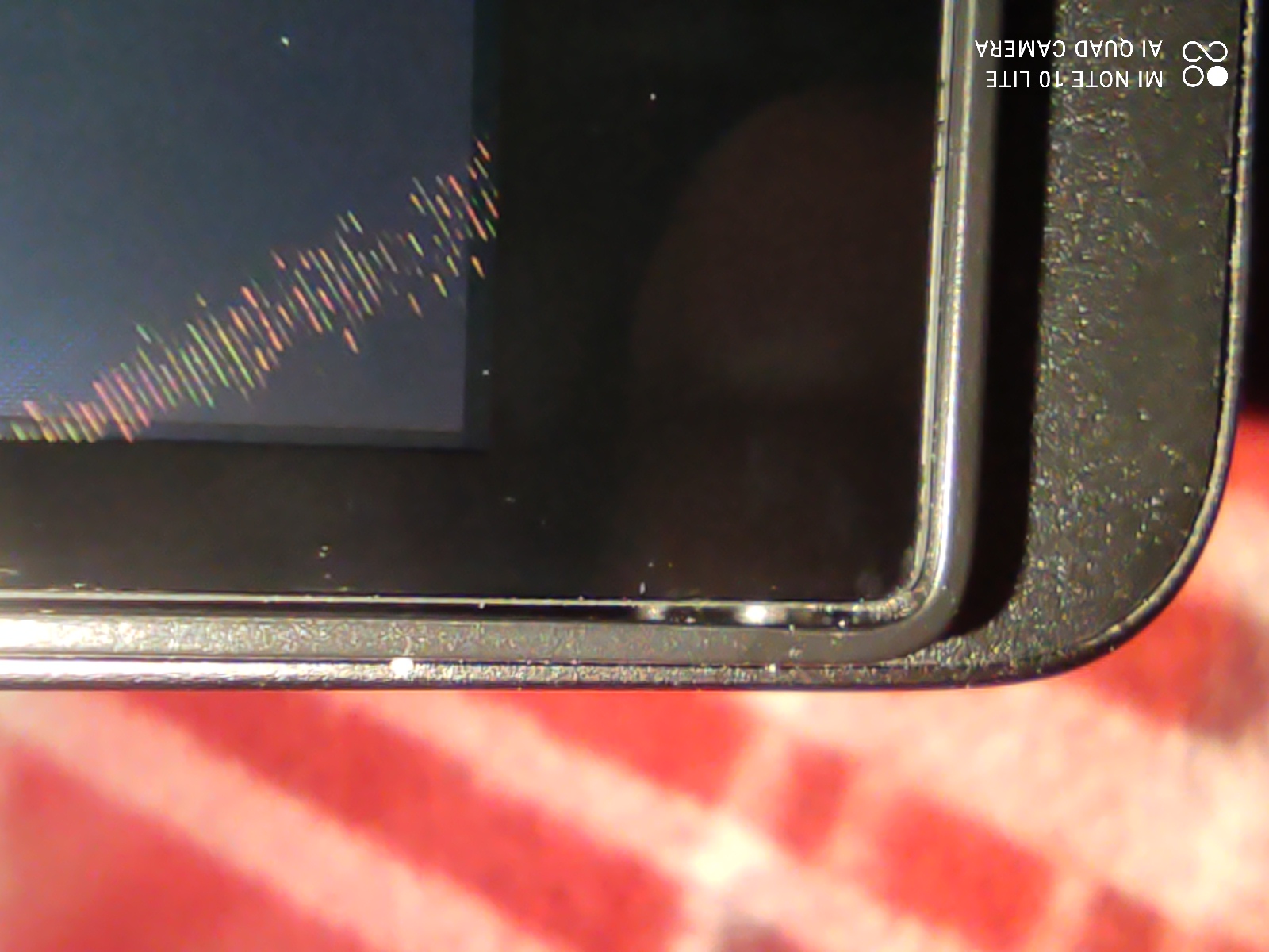 Manufacturing defect ; Particle under the screen and bezel g... - HP ...